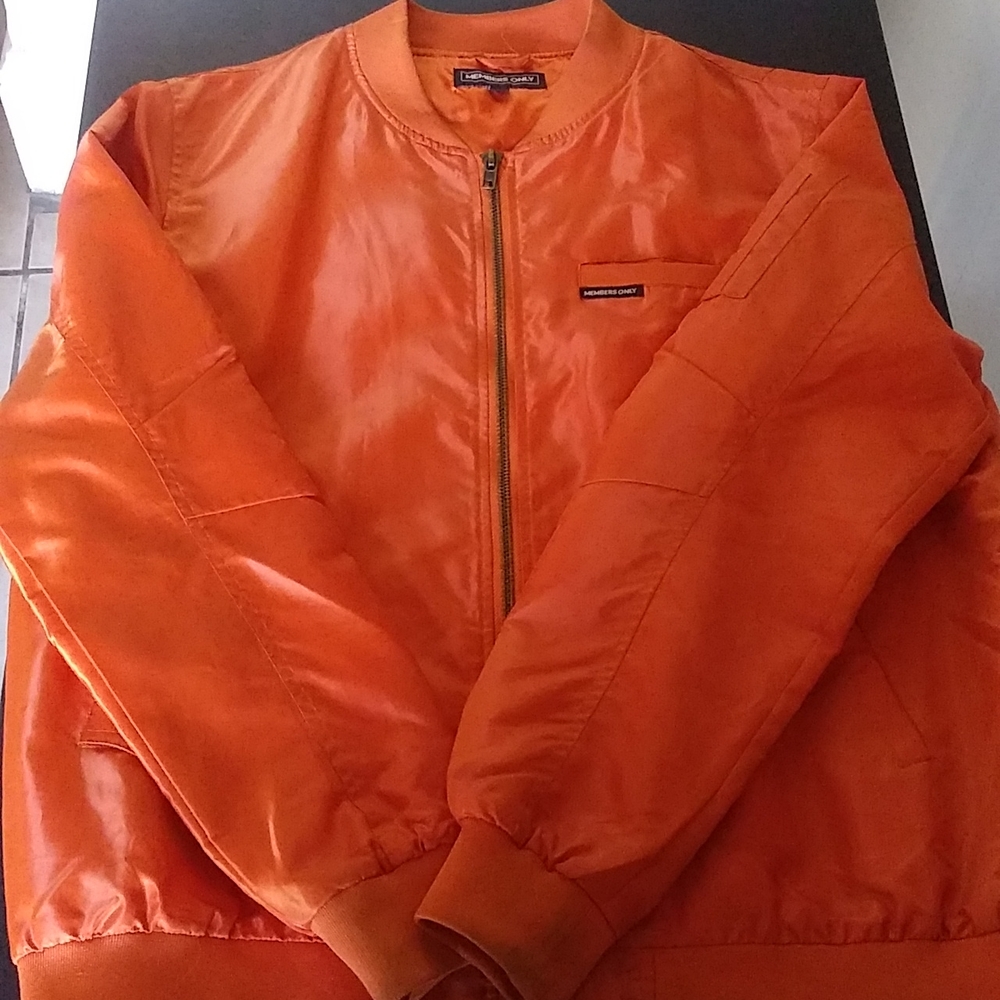 Members only: large size orange jacket.
